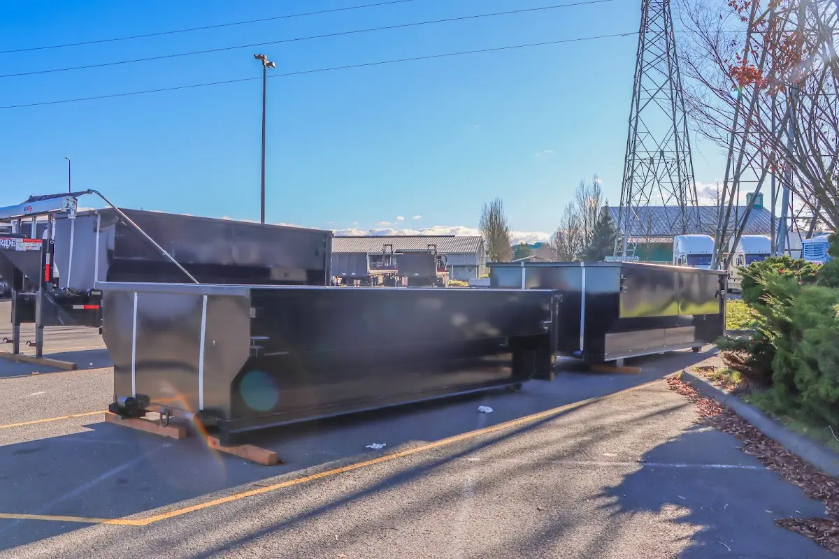 Roll-off dumpster ready for waste disposal at job site for 2 Yard Dumpster Rental in Bradley